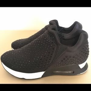 Chic, black fashion sneakers by Gunmetal